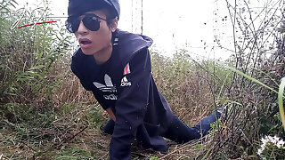 Cute gay Asian twink Jon Arteen speaks French wanks his smooth penis in the rain, lubricated with his saliva moans ejaculates