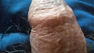 Young man with oil has a fetish for his penis